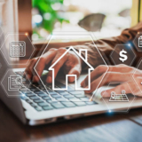 Businessman using laptop to search, Planning and investing in real estate, Property management concept
